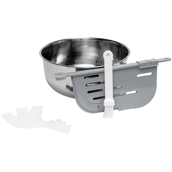 A stainless steel ChocoVision mixing bowl with white handles.
