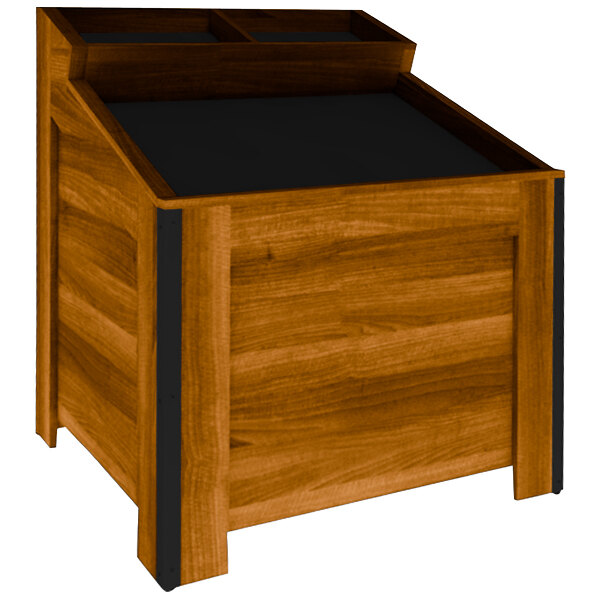 A wooden slanted produce bin with a black top.