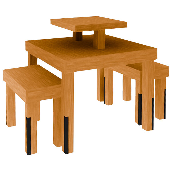 A wooden table with a honey pine finish and a stack of risers.