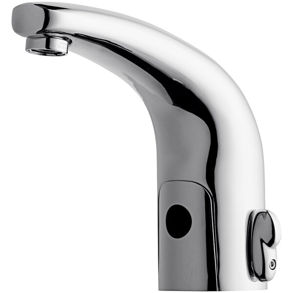 A Chicago Faucets deck-mounted electronic faucet with traditional spout and handle.