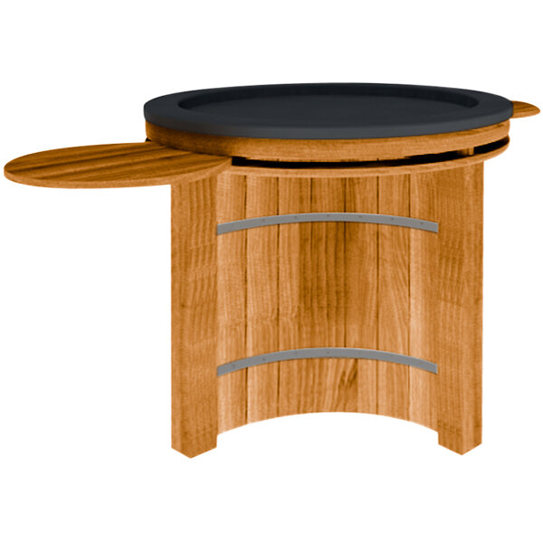 A wooden produce display bin with a round black surface on top.
