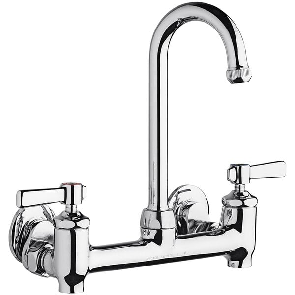 A silver Chicago Faucets wall-mounted faucet with lever handles.