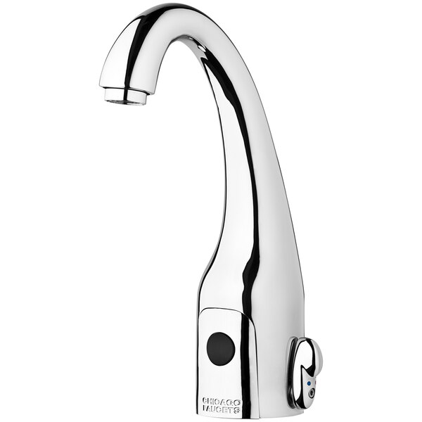 A silver Chicago Faucets deck-mounted touch-free faucet with a black button.