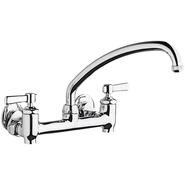 A chrome Chicago Faucets wall-mounted faucet with 2 lever handles.