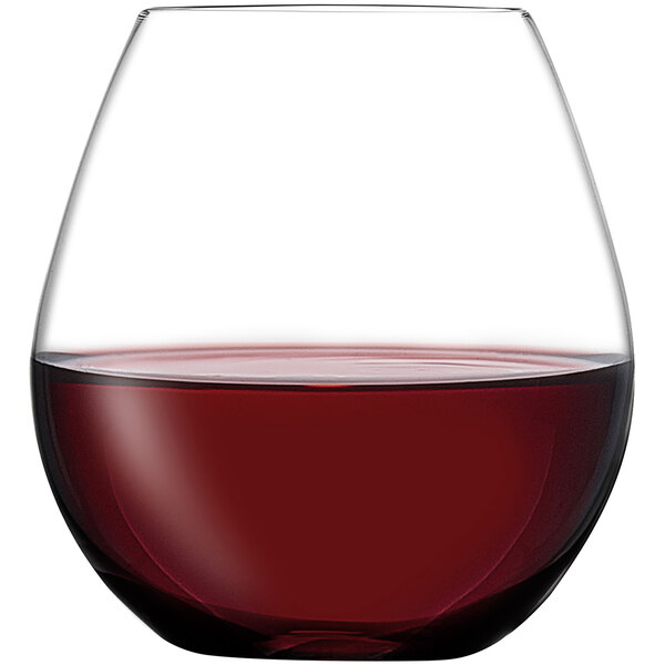 A Nude Pure wine glass filled with red liquid.