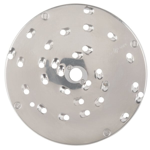 A white circular metal Robot Coupe grating/shredding disc with holes in it.