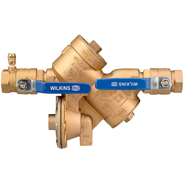 A close-up of a Zurn brass valve with blue handles.