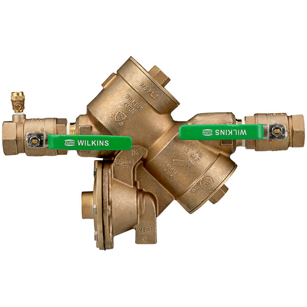 A close-up of a Zurn brass Wye Pattern Reduced Pressure Principle backflow preventer with green handles.