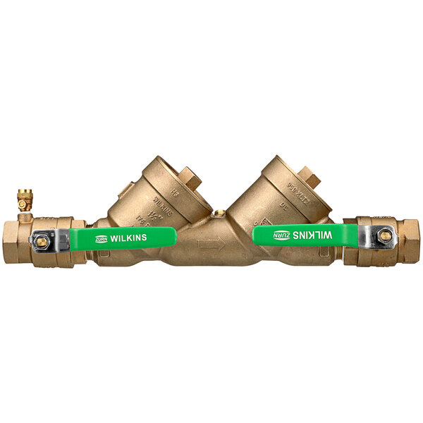 A Zurn double check valve with green labels and top access check covers.