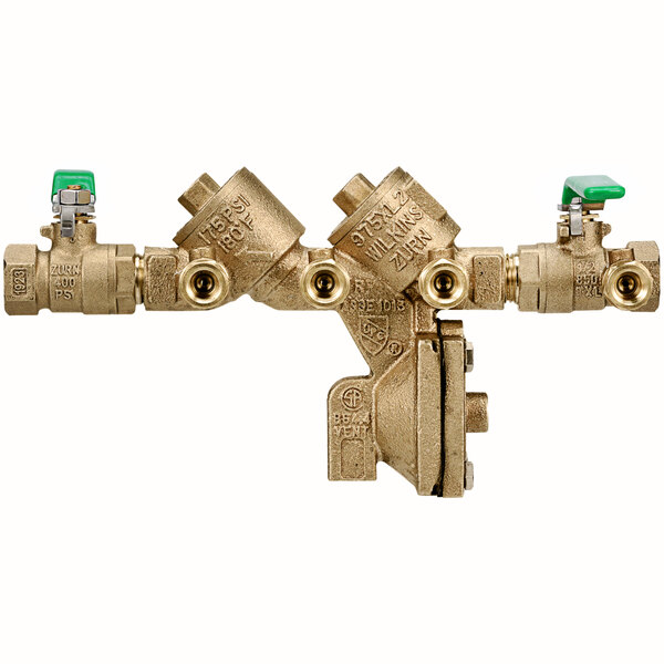 A close-up of a Zurn brass wye pattern backflow preventer with green handles.