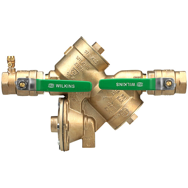 A close-up of a Zurn brass Wye Pattern backflow preventer with green handles.