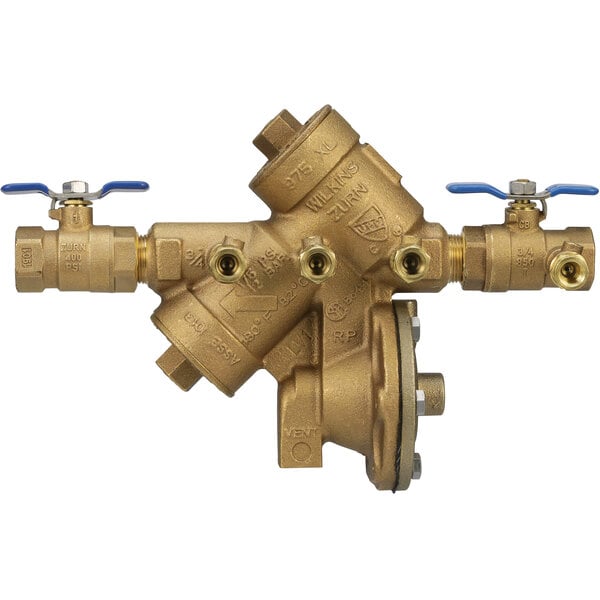 A close-up of a brass Zurn reduced pressure principle backflow assembly valve with two blue handles.