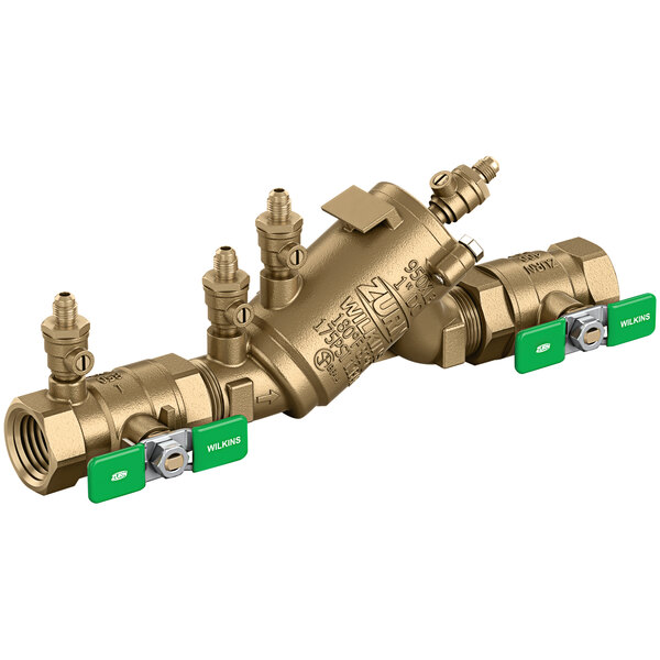 A Zurn brass double check valve with green test fittings.