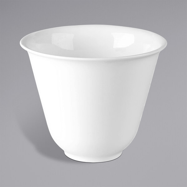 A RAK Porcelain white wine cooler bowl on a gray surface.