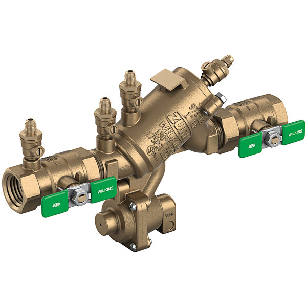 A Zurn brass reduced pressure principle backflow preventer with green handles.