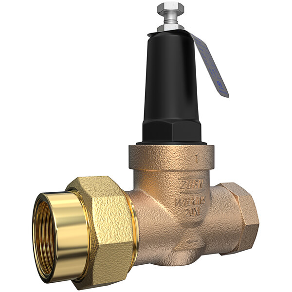 A close-up of a Zurn brass water pressure reducing valve with a gold handle.