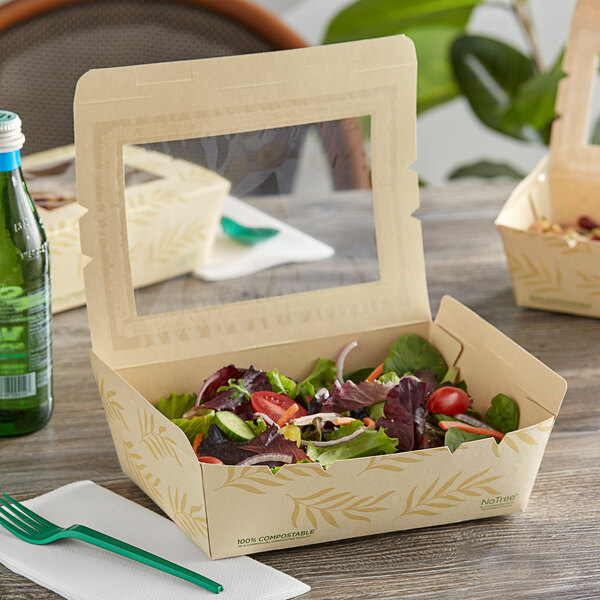 A salad in a World Centric eco-friendly take out container with a PLA window.