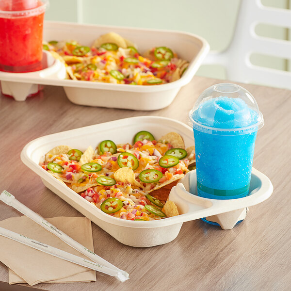 A World Centric compostable fiber serving tray with food and a drink on a table.