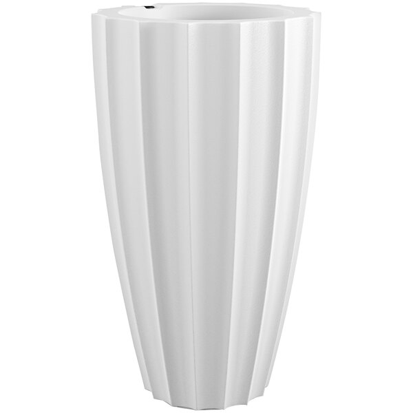 A white planter with a curved bottom and vertical lines.