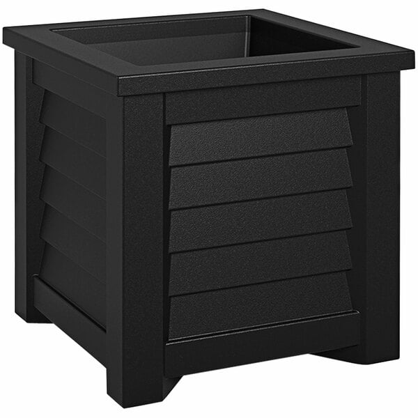 A black square Mayne Lakeland planter on an outdoor table.
