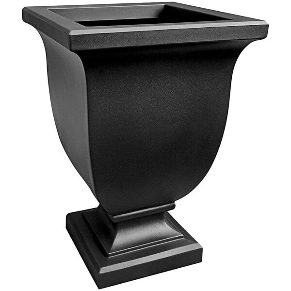 A black rectangular Mayne planter on a table.