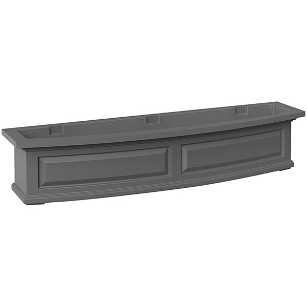 A graphite grey rectangular window box with a window on the side.