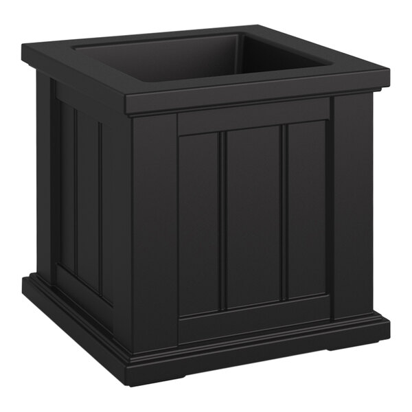 A black square planter box with a square top on a table.