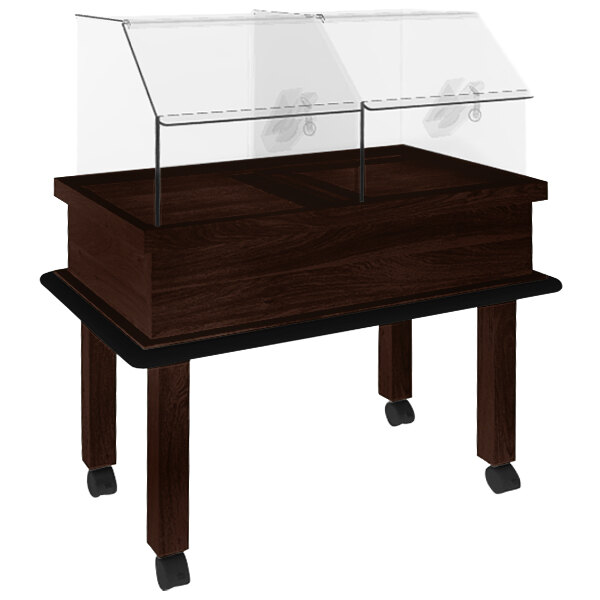 A Marco Company wooden bakery display case with clear glass covers.
