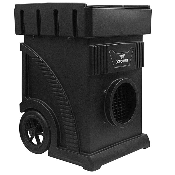 An XPOWER black rectangular portable air scrubber with wheels.