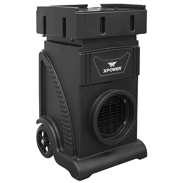A black XPOWER portable air scrubber with a vent on it.
