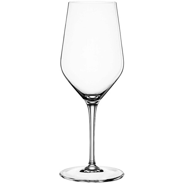 A clear Spiegelau wine glass with a long stem.