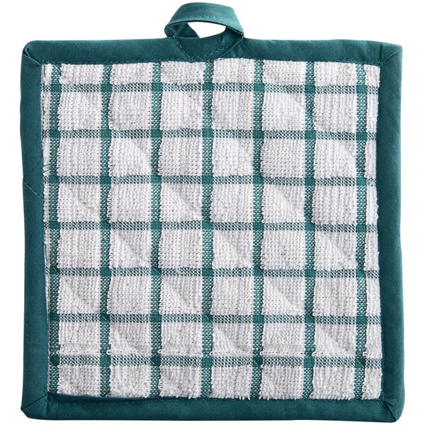 A white pot holder with green windowpane plaid.