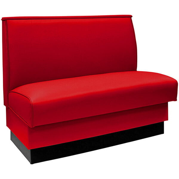 An American Tables & Seating light red fully upholstered booth with black base.