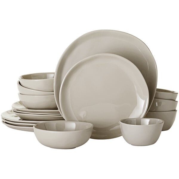 A stack of American Metalcraft Crave Shadow Melamine plates and bowls on a white background.