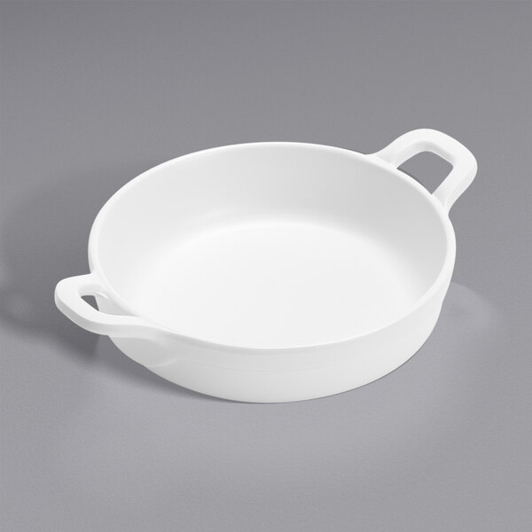 An American Metalcraft white melamine bowl with two handles.
