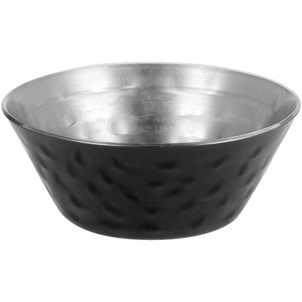 A black stainless steel sauce cup with a hammered texture on the outside.
