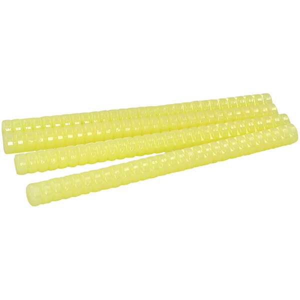 A group of yellow plastic tubes with holes.