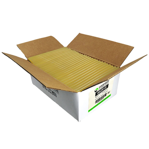A box of Surebonder tan glue sticks with yellow tubes inside.