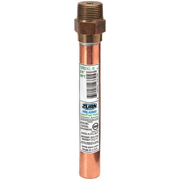 A copper pipe with a white label attached to a Zurn 1260XL-B Water Hammer Arrester.