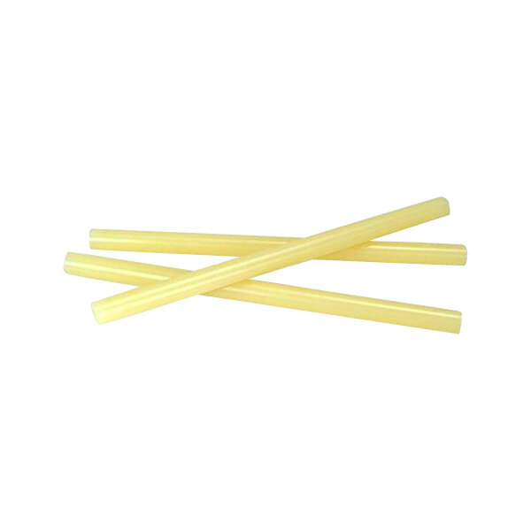A close-up of a tan Surebonder glue stick with yellow plastic straws.