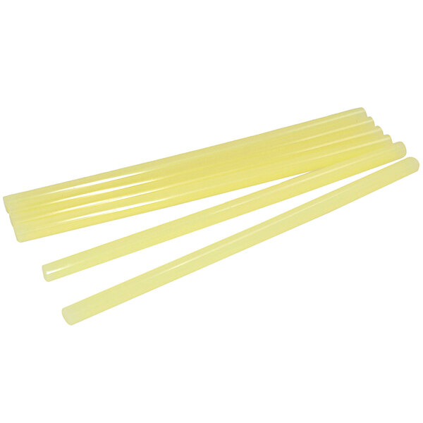 A group of yellow plastic Surebonder glue sticks.