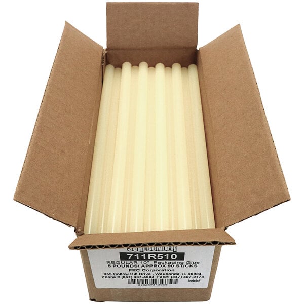 A white and tan cardboard box with a package of Surebonder high temp tan glue sticks.