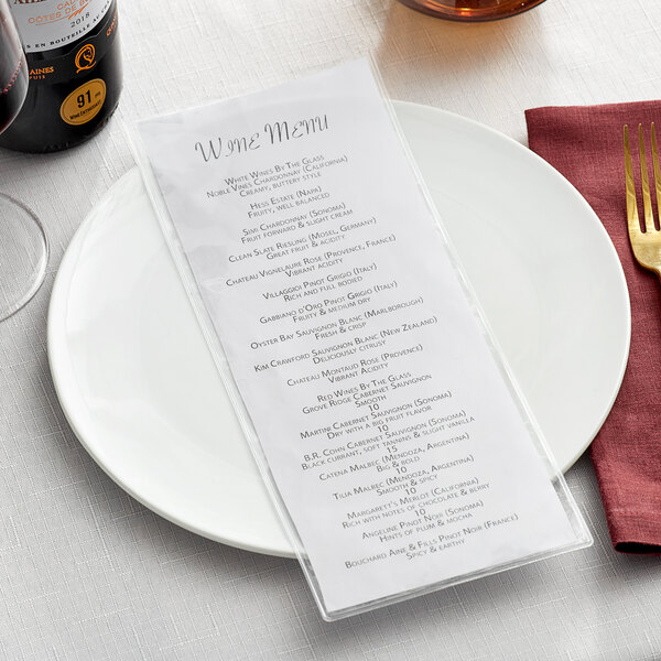 A table set with a white plate and a clear Choice 2-View Single Pocket Menu Cover with a menu inside.