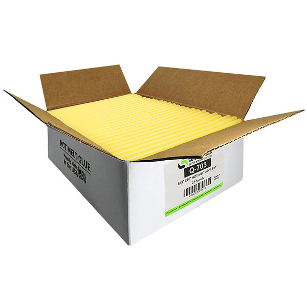 A white box with yellow Surebonder glue sticks inside.