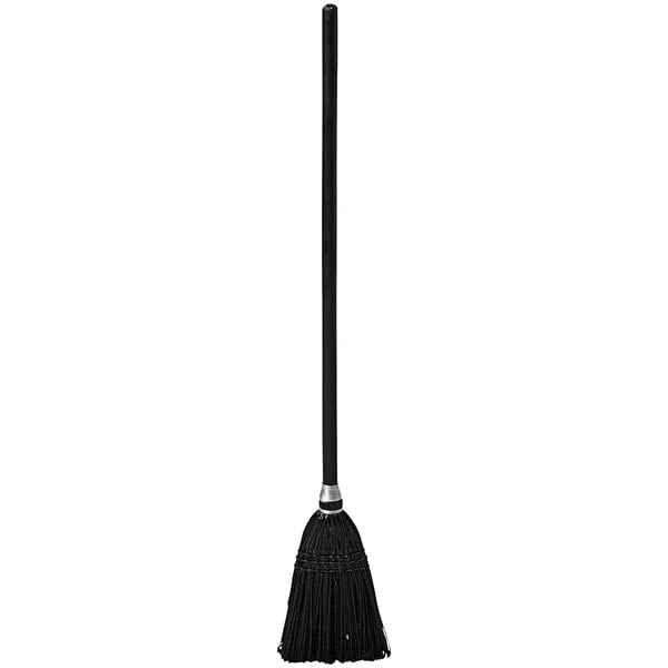A black Rubbermaid Executive Series lobby broom with a wood handle.