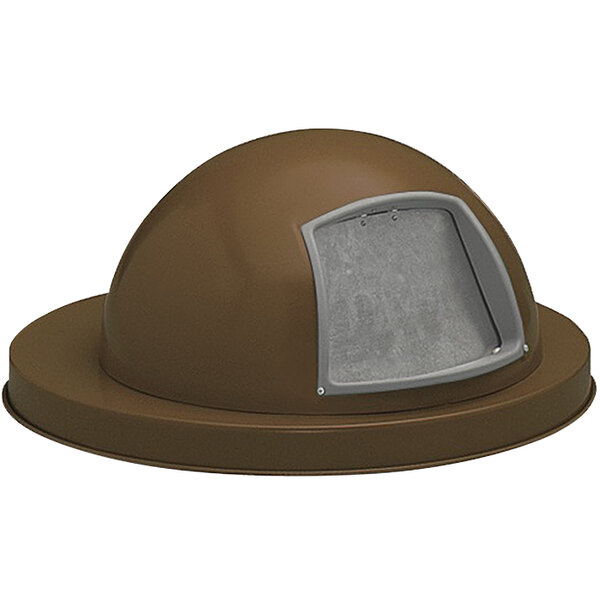 A brown steel dome lid with a push door on a brown round object.