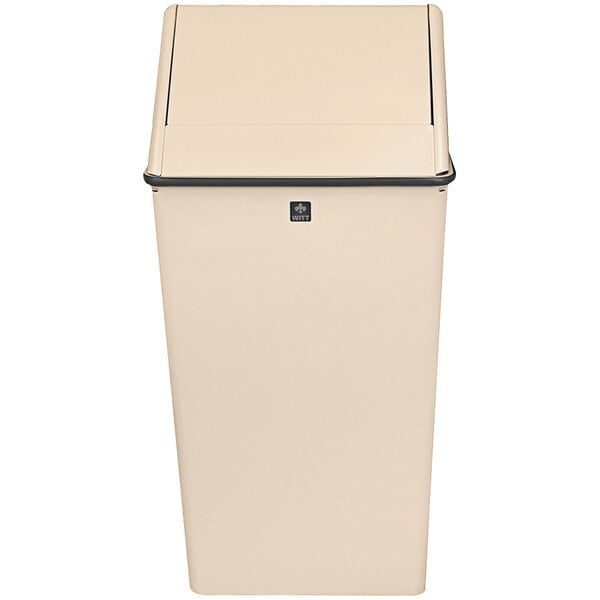 A tan rectangular Witt Industries 13 gallon steel trash can with a swing top lid.
