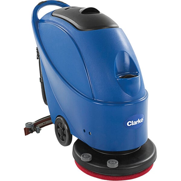 A blue Clarke walk behind floor scrubber with red wheels.