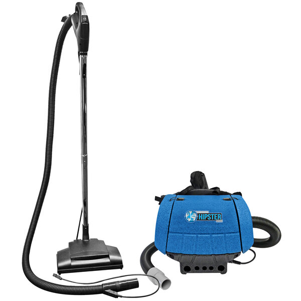 A Sandia corded vacuum cleaner with blue and black bag attached to hose.