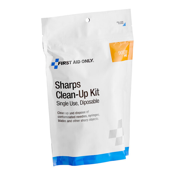 A white First Aid Only package with blue and white text for a Sharps Clean-Up Kit.